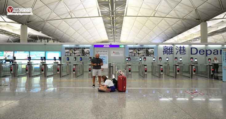 HK airport to close concourse as flights plummet