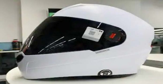 smart helmet made by students of to save lives as well as fuel