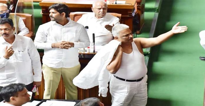 congress mla b.k sangamesh referred to breach of privilege after shirtless protest