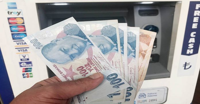 turkish lira tumbles after sacking of central bank head
