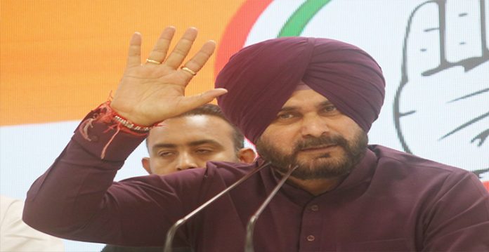 sidhu hoists black flag to support protesting farmers