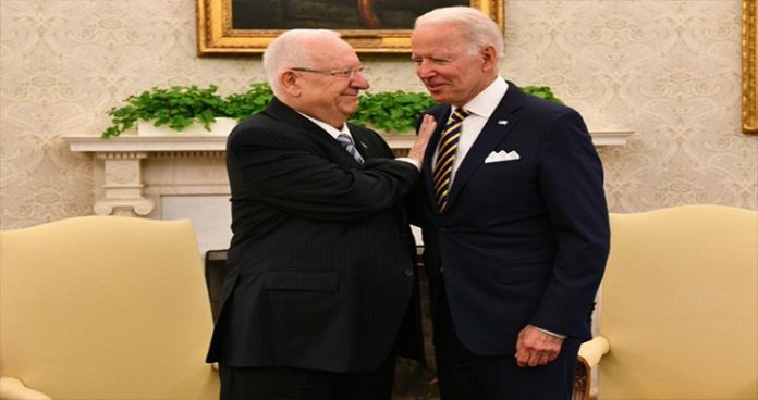 biden meets israeli counterpart, conveys unwavering support