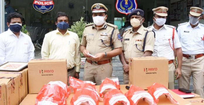 hero motors hands over 1000 face shields to rachakonda police