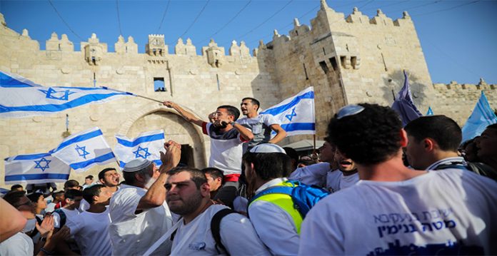 israeli flag march in jerusalem to renew tension hamas