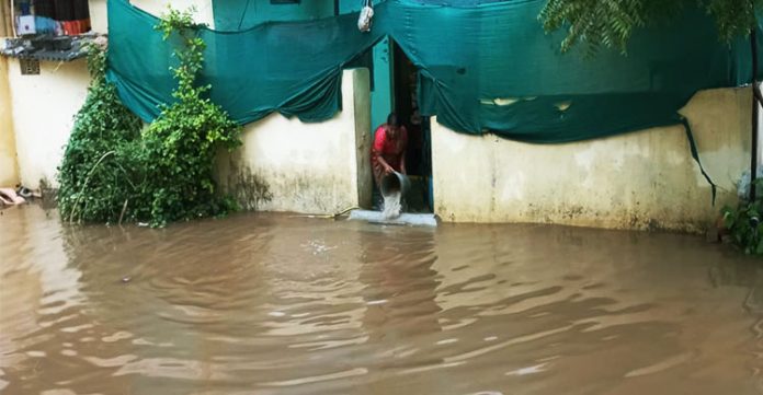 Intermittent rain leaves city colonies inundated and streets into quagmires