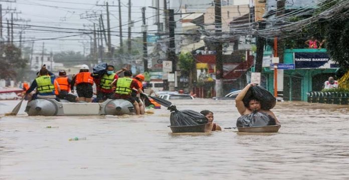 philippines evacuates over 15,000 people amid flood threat