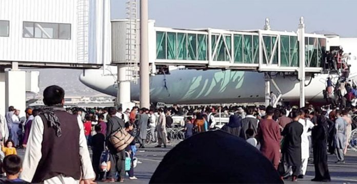 kabul airport gets chaotic as us reportedly prioritises american embassy staff; afghans desperate to leave