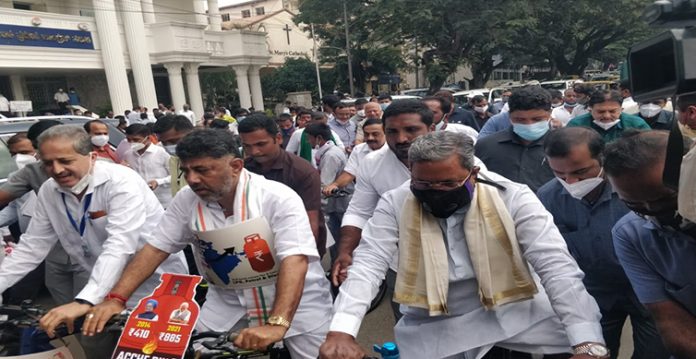 Karnataka Cong leaders ride bicycles to Assembly to protest price rise