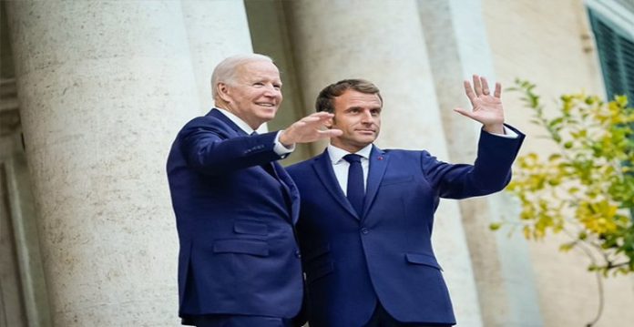 joe biden meets emmanuel macron , seeks to rebuild trust