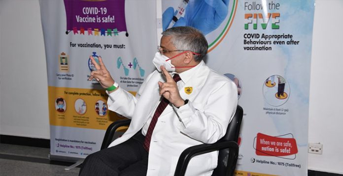 maintain precautions as covid not over yet, warns aiims chief