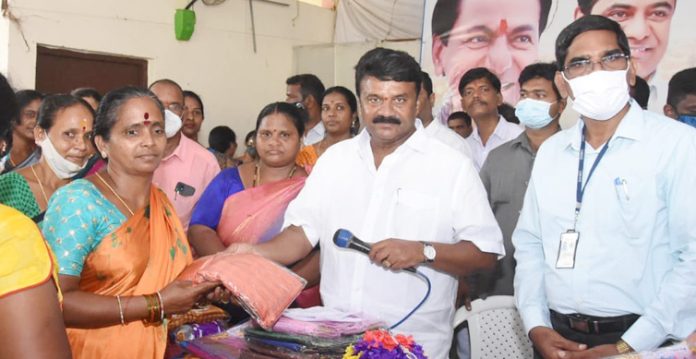minister talasani srinivas yadav distributes bathukamma sarees