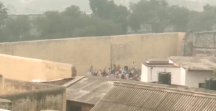 Inmates of UP jail on rampage, hold officials captive