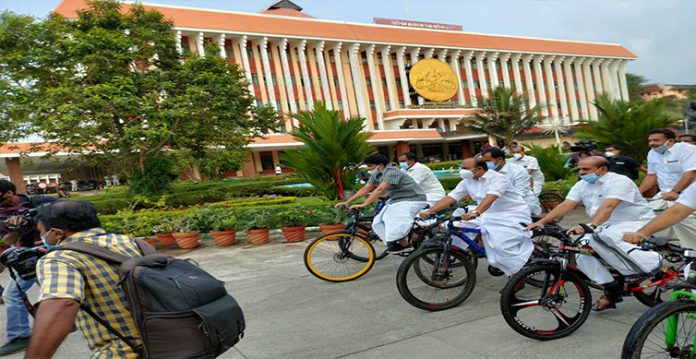 Kerala Oppn MLAs ride cycles to Assembly to protest