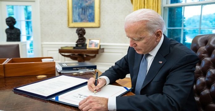 Joe Biden signs bill aiming to punish China for human rights abuses against Uyghurs