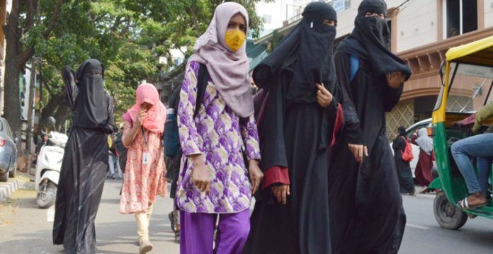 graffiti surfaces in karnataka town against hijab verdict