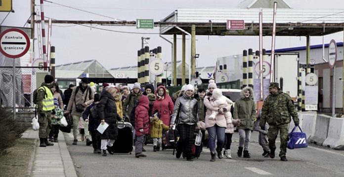 Refugees Leave Ukraine for Poland