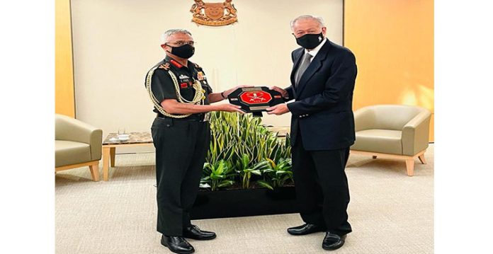 Indian Army Chief General Manoj Mukund Naravane and Singapore Defence Minister Ng Eng Hen