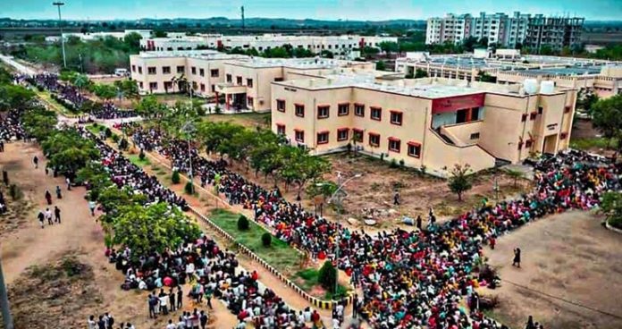 students of telangana's iiit basara continue protest