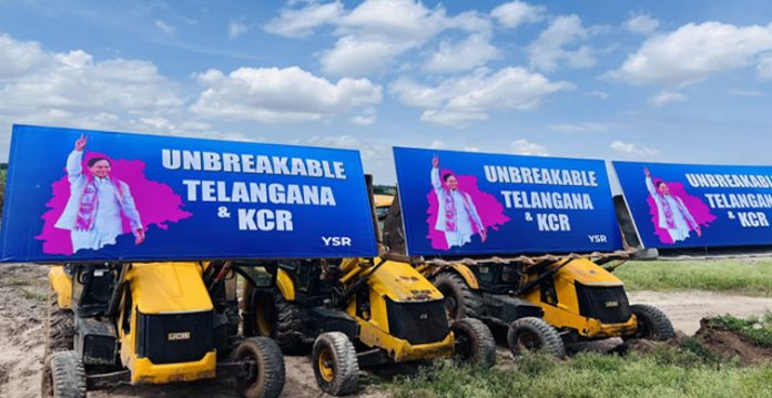trs puts up anti bulldozer hoardings at munugode