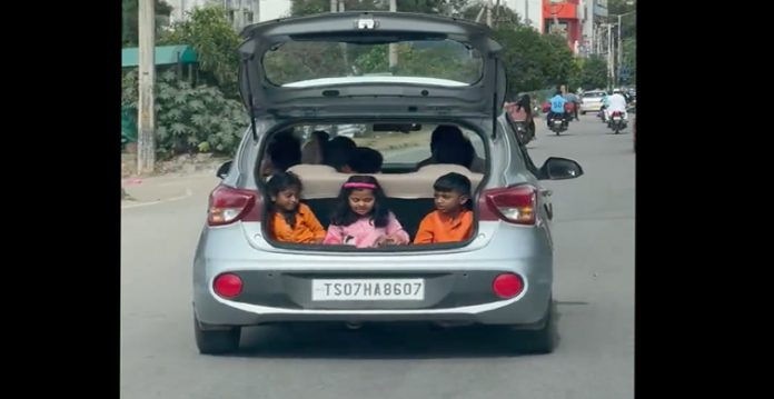 traffic police issue challan after citizen shares video of kids in car boot