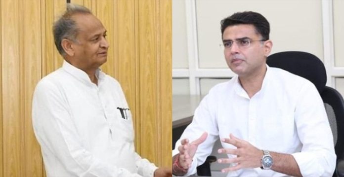 gehlot, pilot attend bjy meeting, sit at a distance without talking to each other