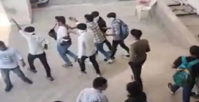 right wing activists assault youths in university campus in surat