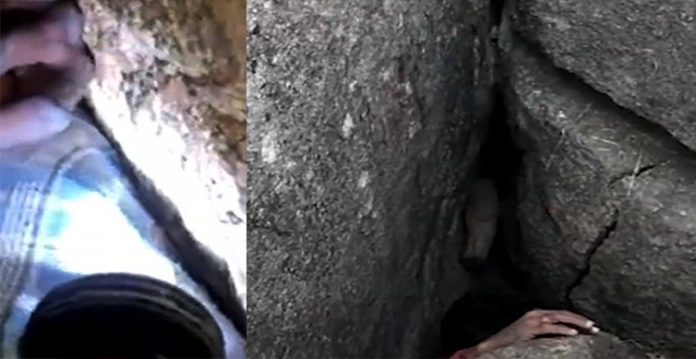 operation on to rescue telangana man stuck under rocks