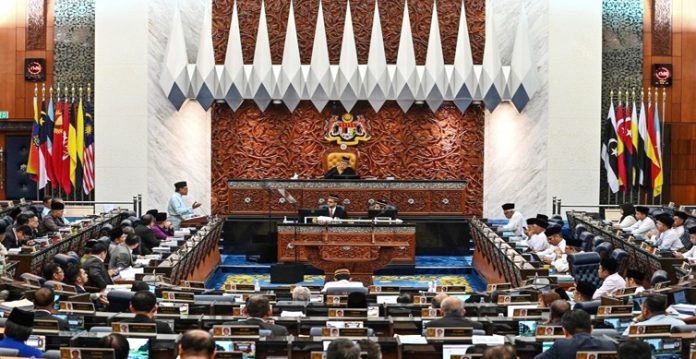 malaysian prime minister anwar ibrahim proposes the national budget at the parliament house in kuala lumpur, malaysia, feb. 24, 2023. (malaysia's department of information/handout via xinhua/ians)