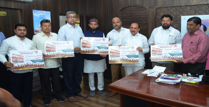 telangana home minister unveils poster for tuwjf national conference