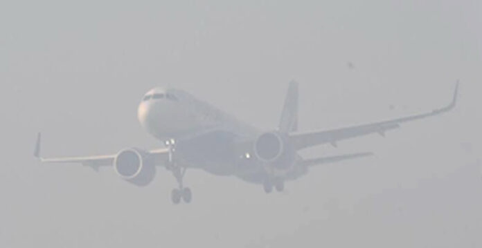 plane in fog