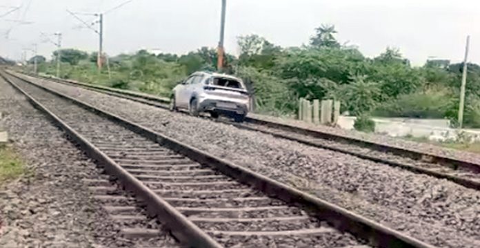 car on railway track